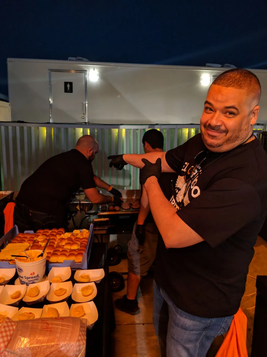 El Gringo crew member grilling fritas at the SOBEWFF Burger Bash 2018