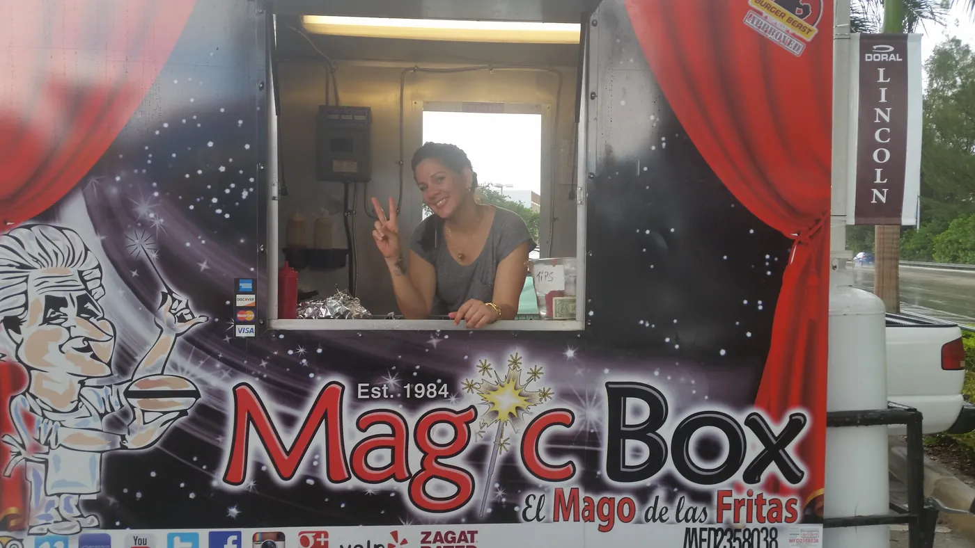 The Magic Box food truck serving window at a South Florida event